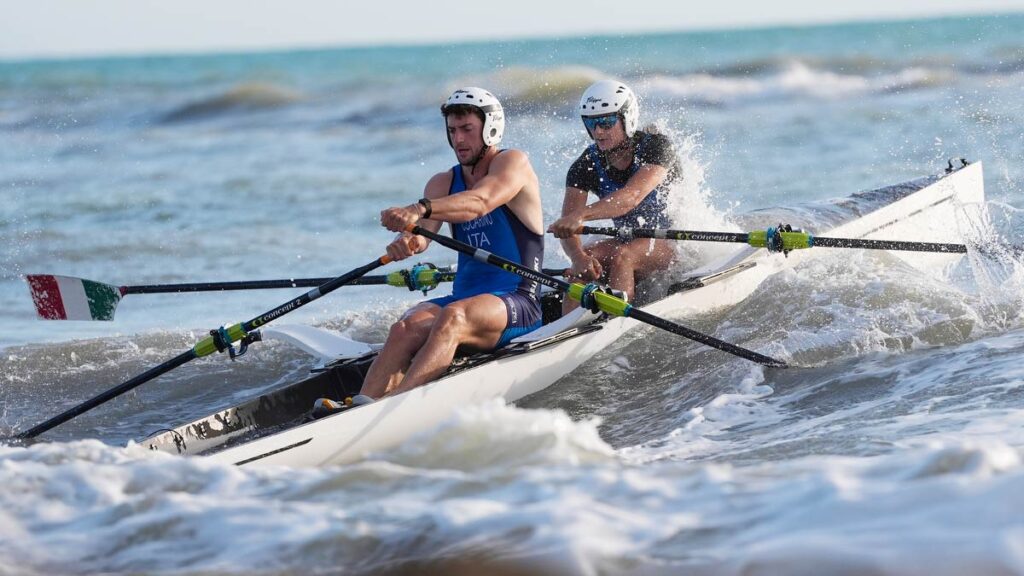 Federica Cesarini and Federico Ceccarino wearing crash helmets.