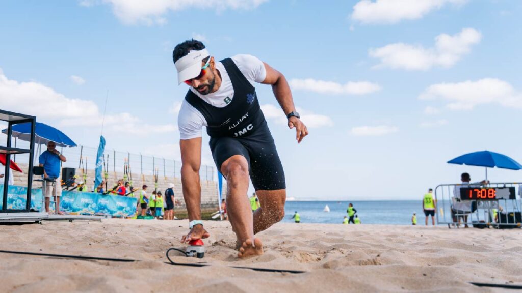 Saudi Arabia's Abdullah Hussain Alhay reaches for the buzzer in the time trial of the men's solos.