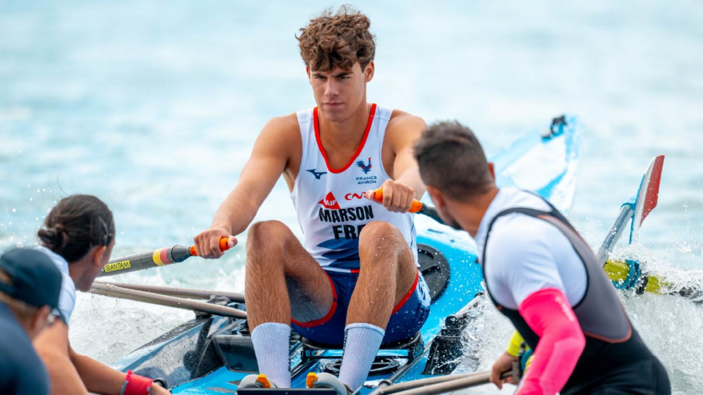 France's Alban Marson waits in bow for Lisa van Cotthem, his partner in the under-19 mixed double.