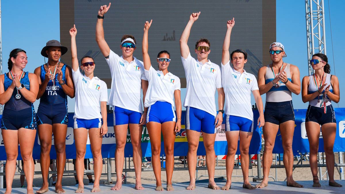 Circolo Canottieri Saturnia's mixed quad celebrates. winning the 2026 Italian beach sprint national championship