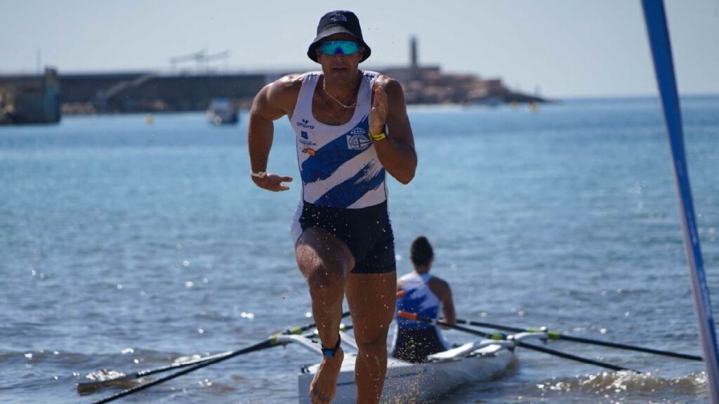Ander Martín runs to the line in the mixed double.