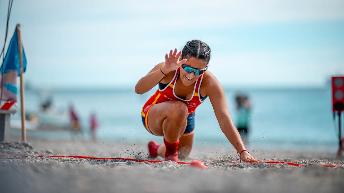 Spain's Lucia Navarro hits the buzzer on her way to a silver medal in the junior women's solo at Genoa 2024.